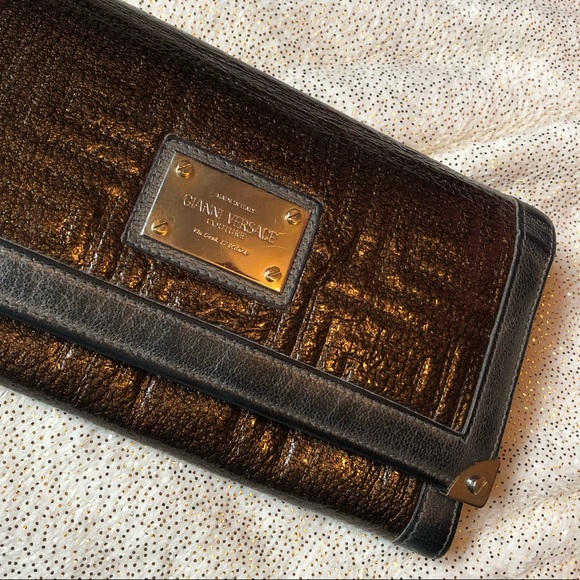 Versace Handbags - Item on hold for bundle.